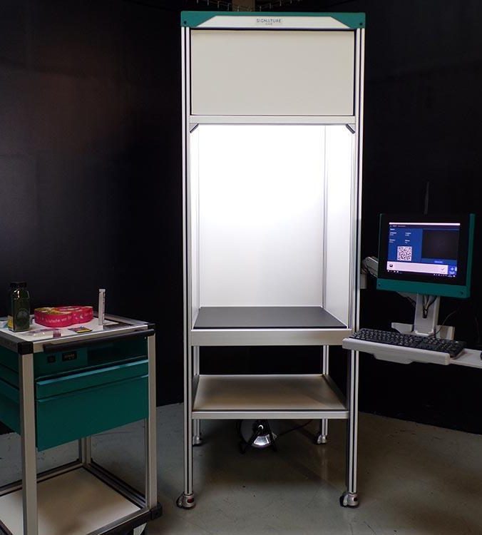 Armoire équipée d'une caméra pour réalisation de photos